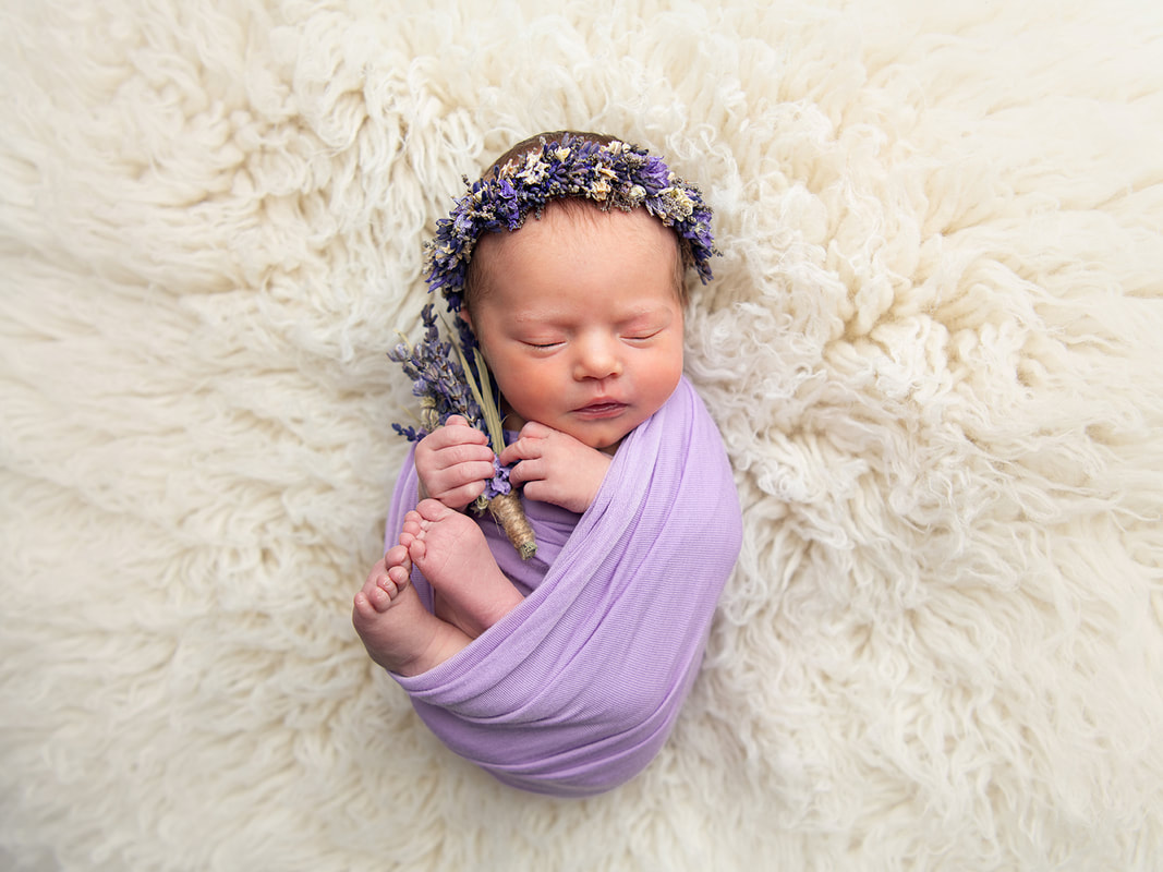 Newborn baby girl photography with pretty headband colourful newborn photo 